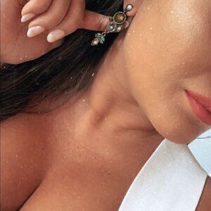Green statement earrings